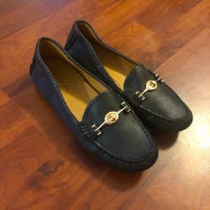 Black leather Coach loafers